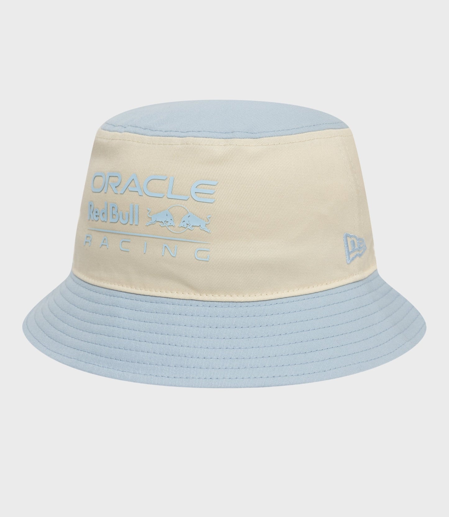 Front close up of the beige crown with a light blue top on the New Era X Oracle Red Bull Racing contrast tapered bucket hat