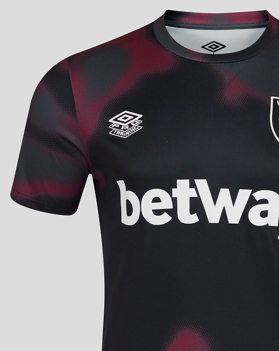 Close up of West Ham United warm up jersey showing crest on chest and Umbro logo