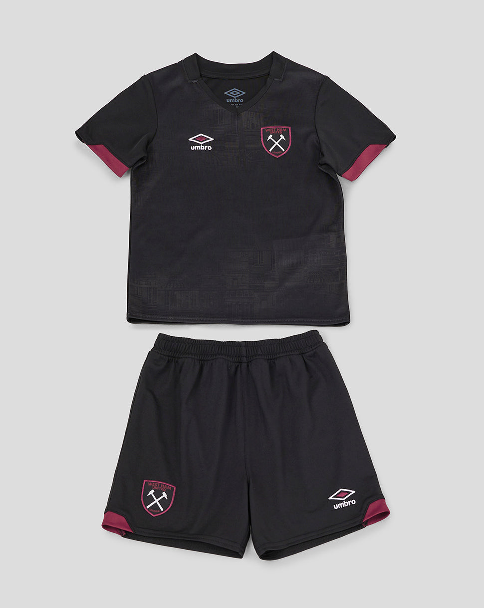 West Ham United 24/25 away infant kit in black with pink trim, featuring the club crest and Umbro logos on shirt and shorts.