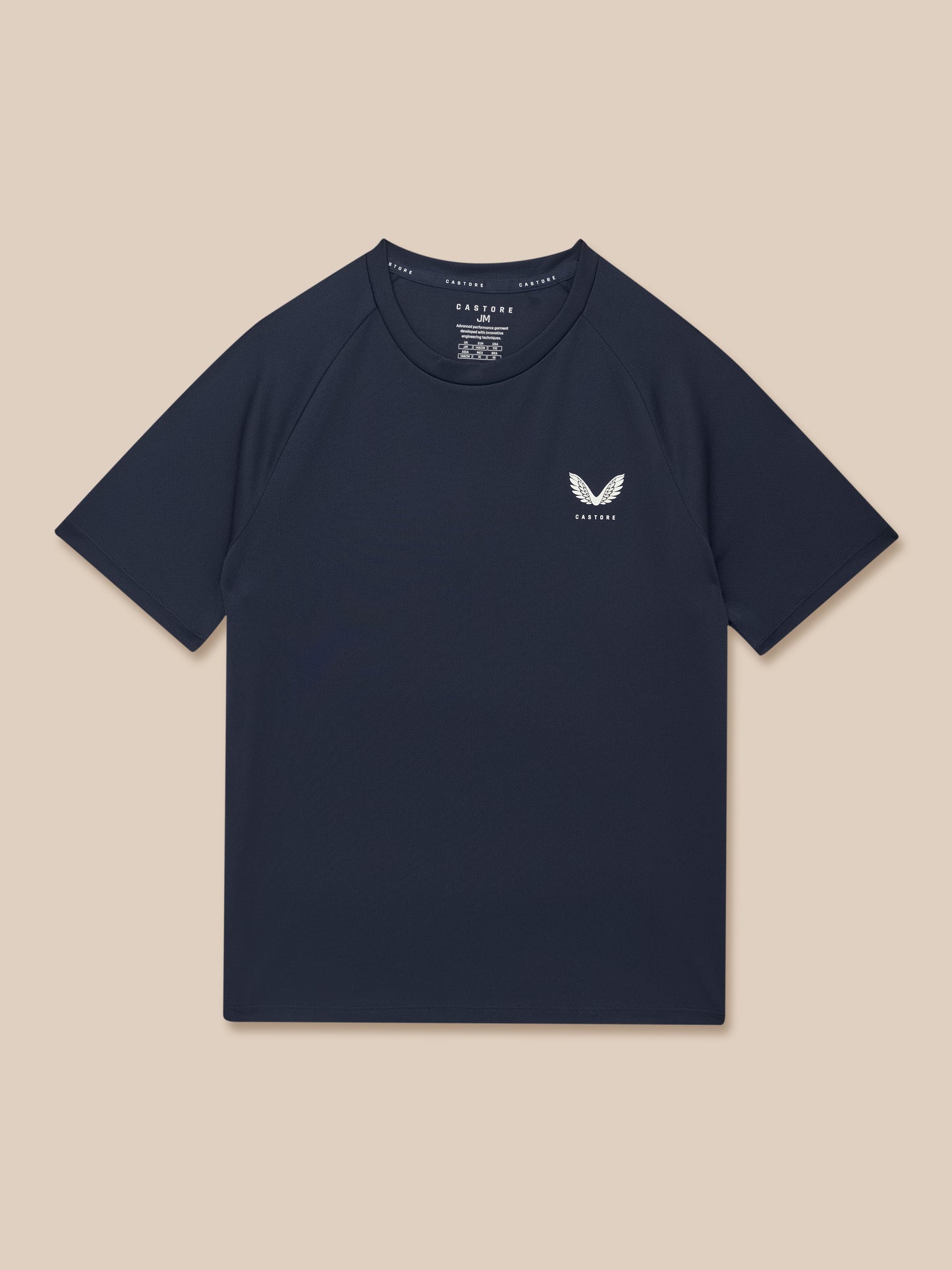 Navy Junior Adapt short sleeve T shirt laid flat with white Castore logo on chest