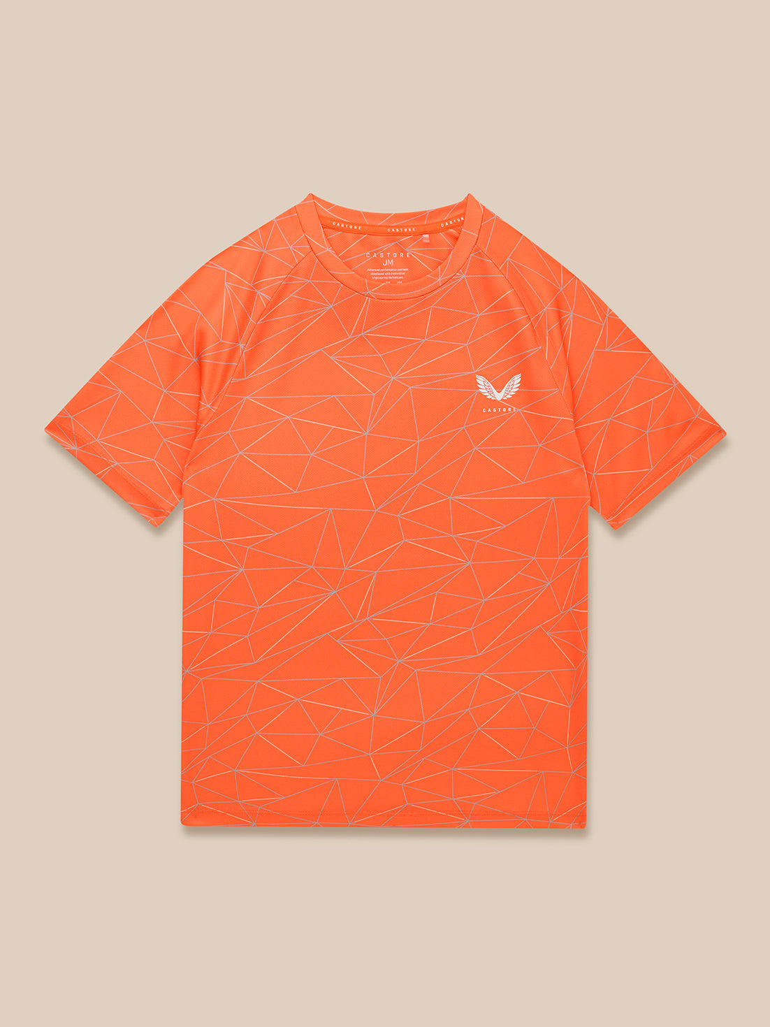 Bright orange Junior Adapt all over print short sleeve T shirt with geometric line pattern and Castore logo on left chest.