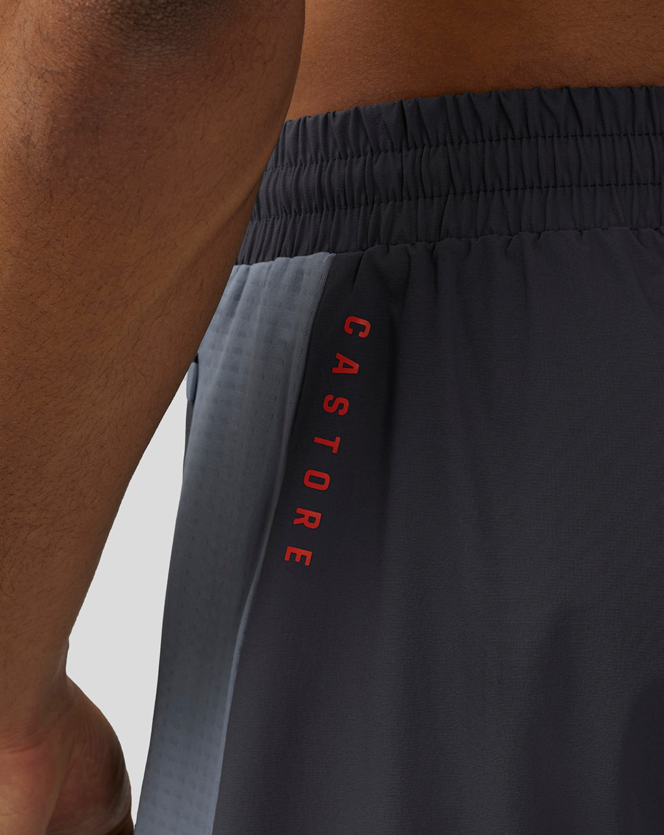 Close up of the waistband showing Protek branding on pewter blue Apex shorts.