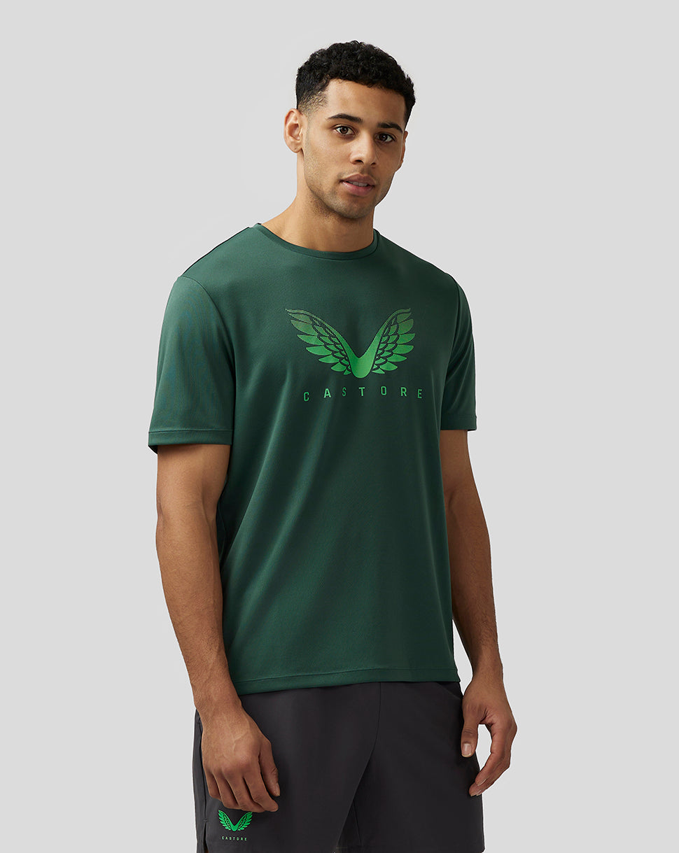 Man wearing green Adapt Short Sleeve Graphic T Shirt with large wing graphic on chest