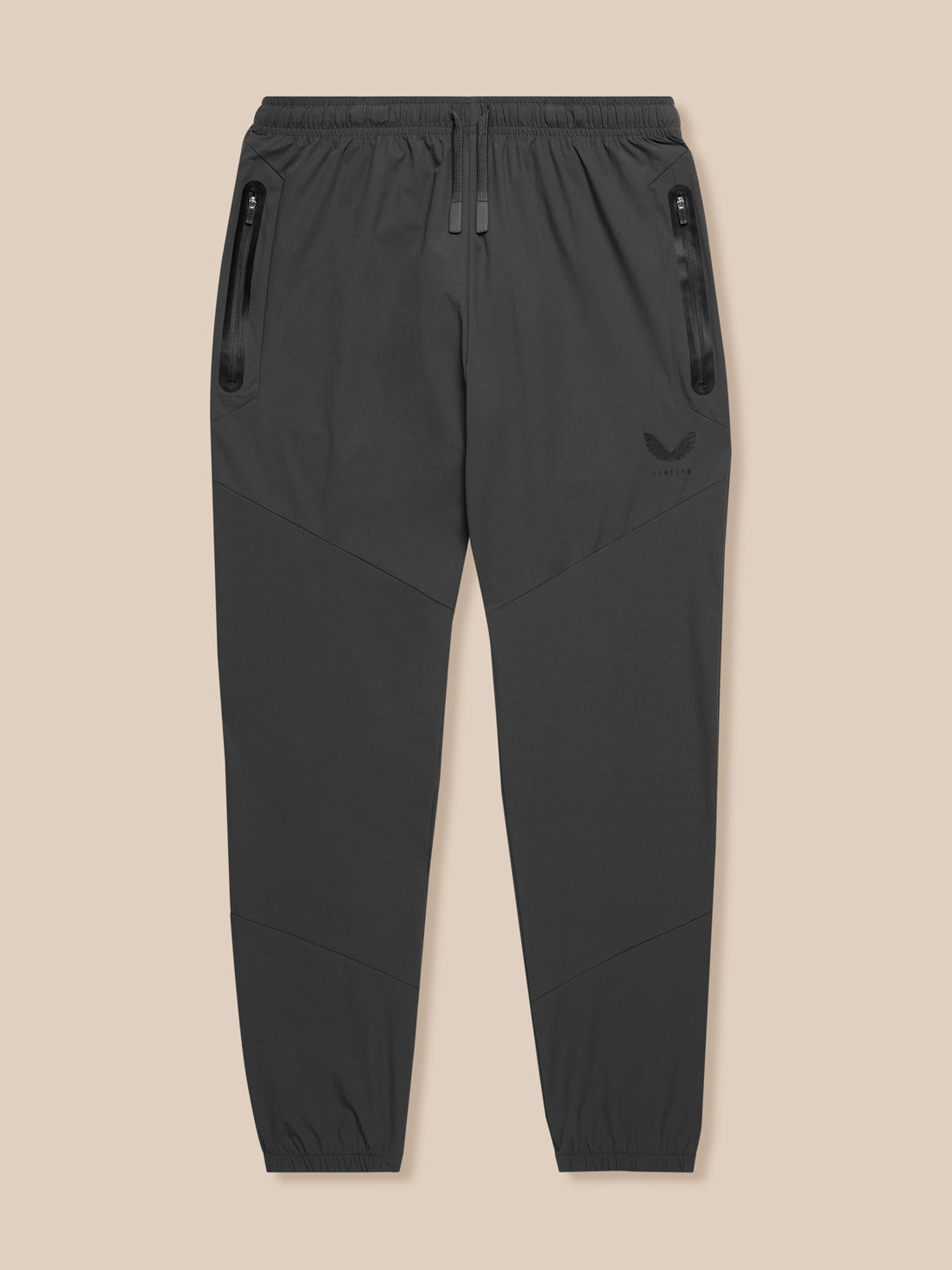 Grey lightweight Flex joggers with elastic waistband, water resistant zip pockets and Castore branding on the left leg.
