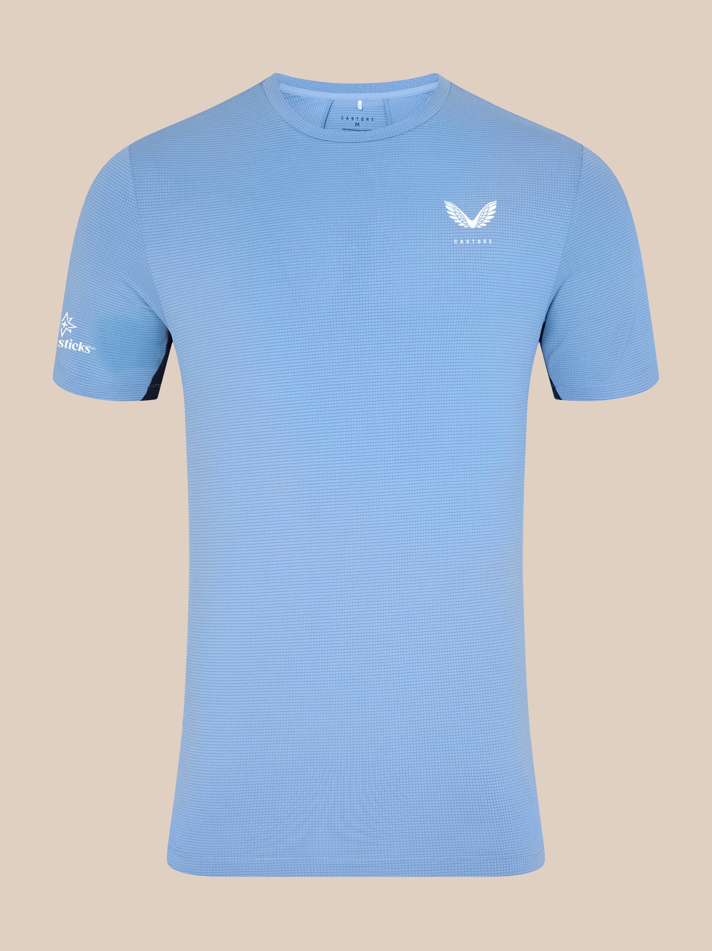 Close up showing the sky blue Apex Training T-Shirt chest area with textured fabric and Castore logo.