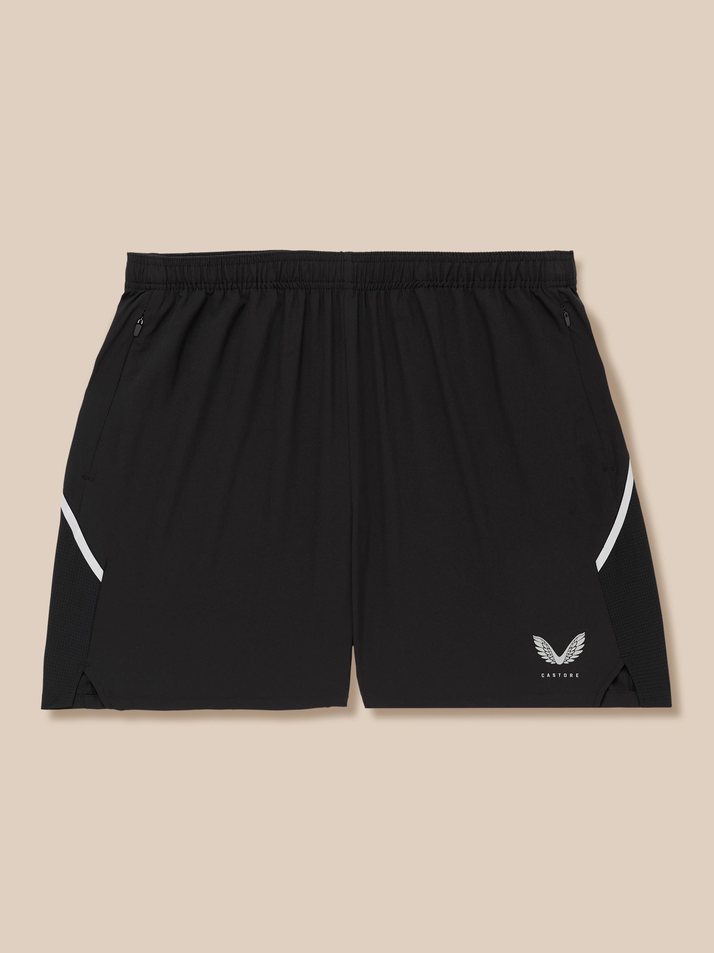 Close-up of black Apex Training 6 inch shorts featuring elastic waistband, zip pockets, and Castore logo.