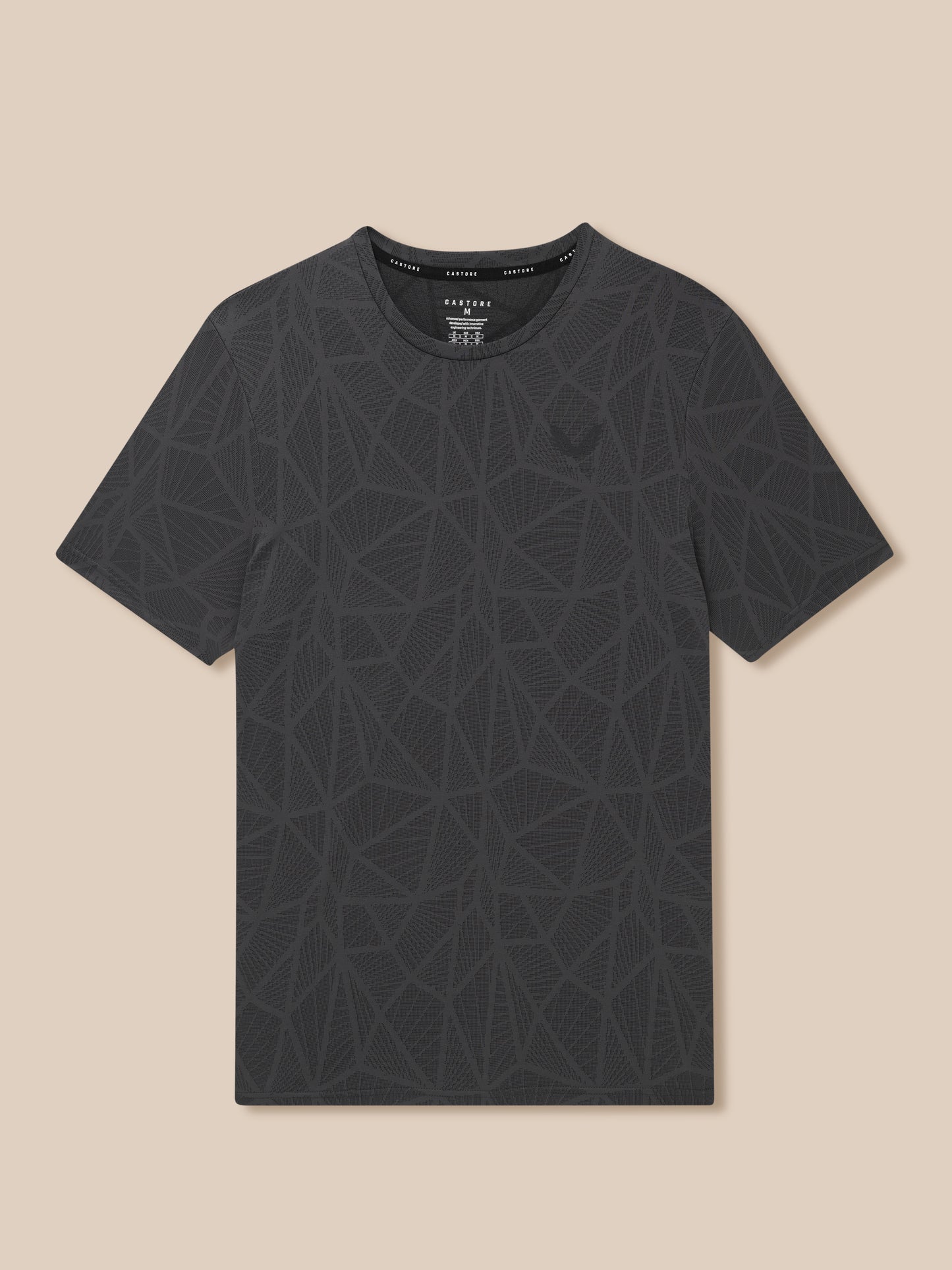 Front close up of Flow Training Engineered Knit T Shirt in black with crew neck and geometric print