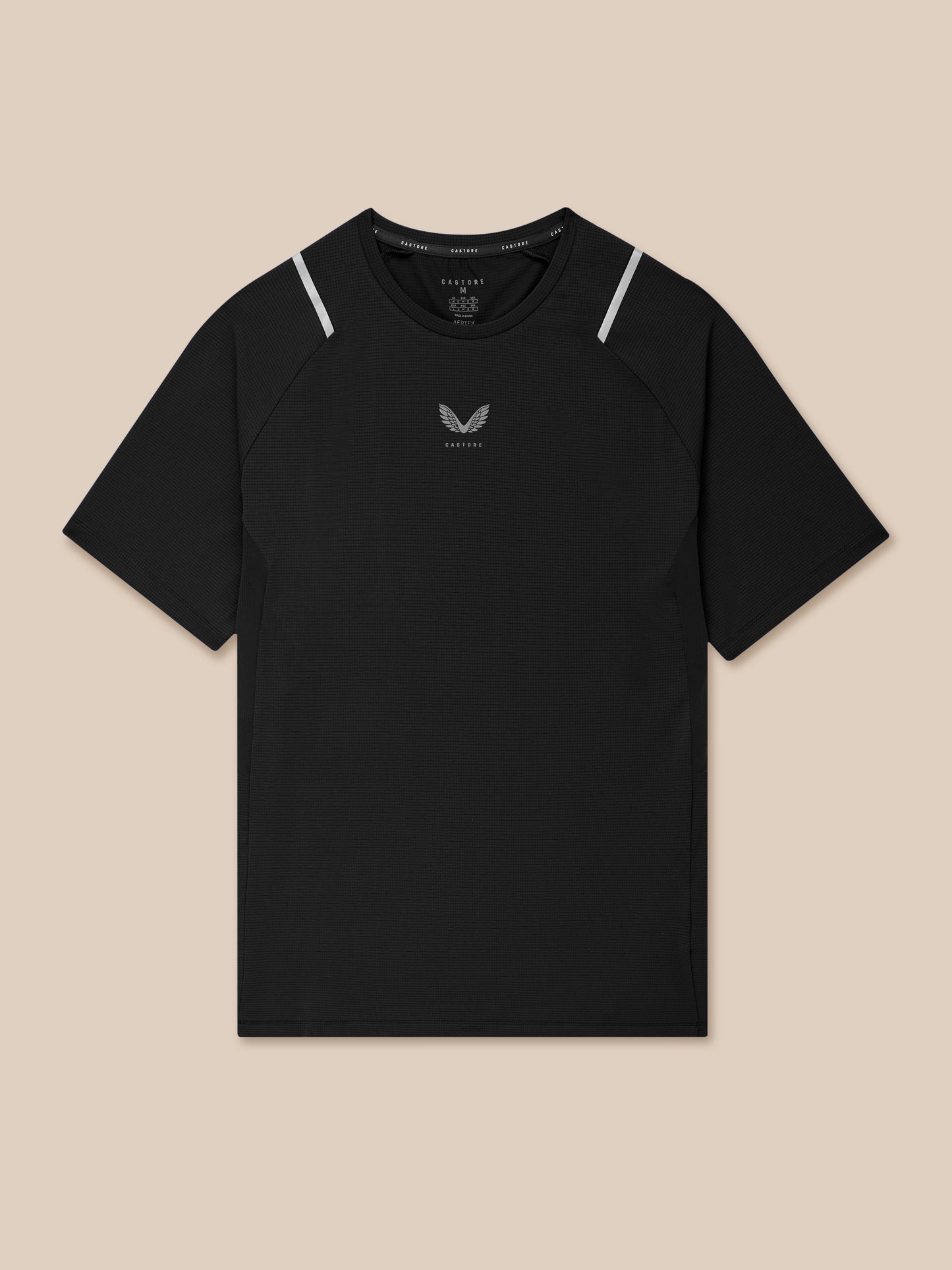 Front view of a black Apex Training T-Shirt laid flat on a beige background with the small white Castore logo centered on the chest.