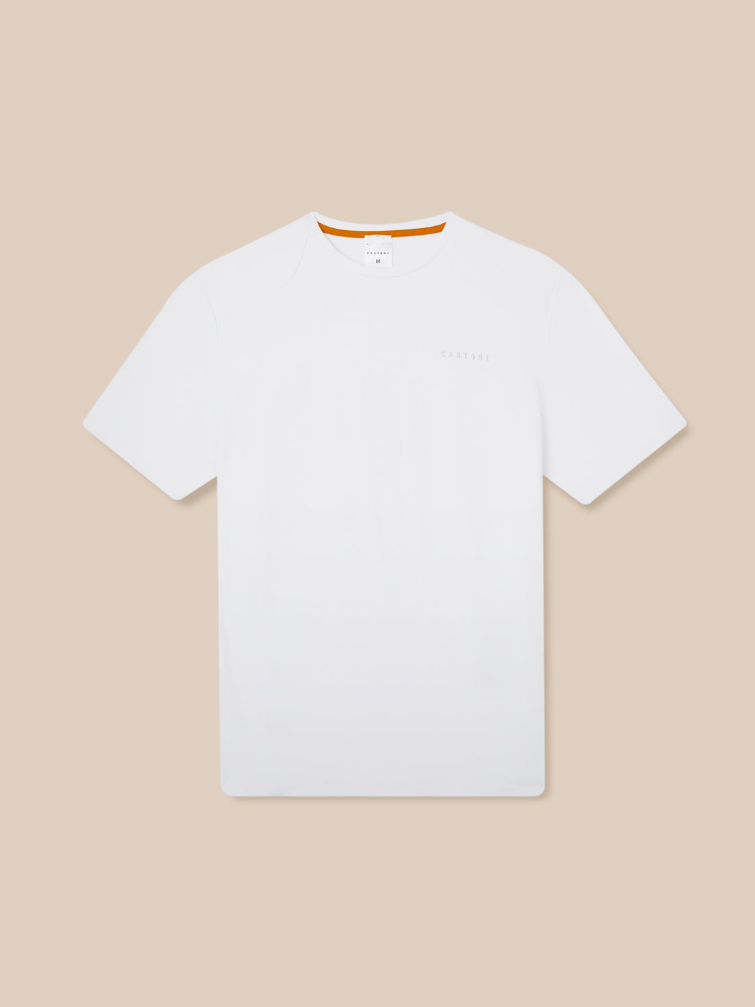 Front view of white Elevated Lifestyle T Shirt laid flat showing left chest Castore logo and orange neck trim
