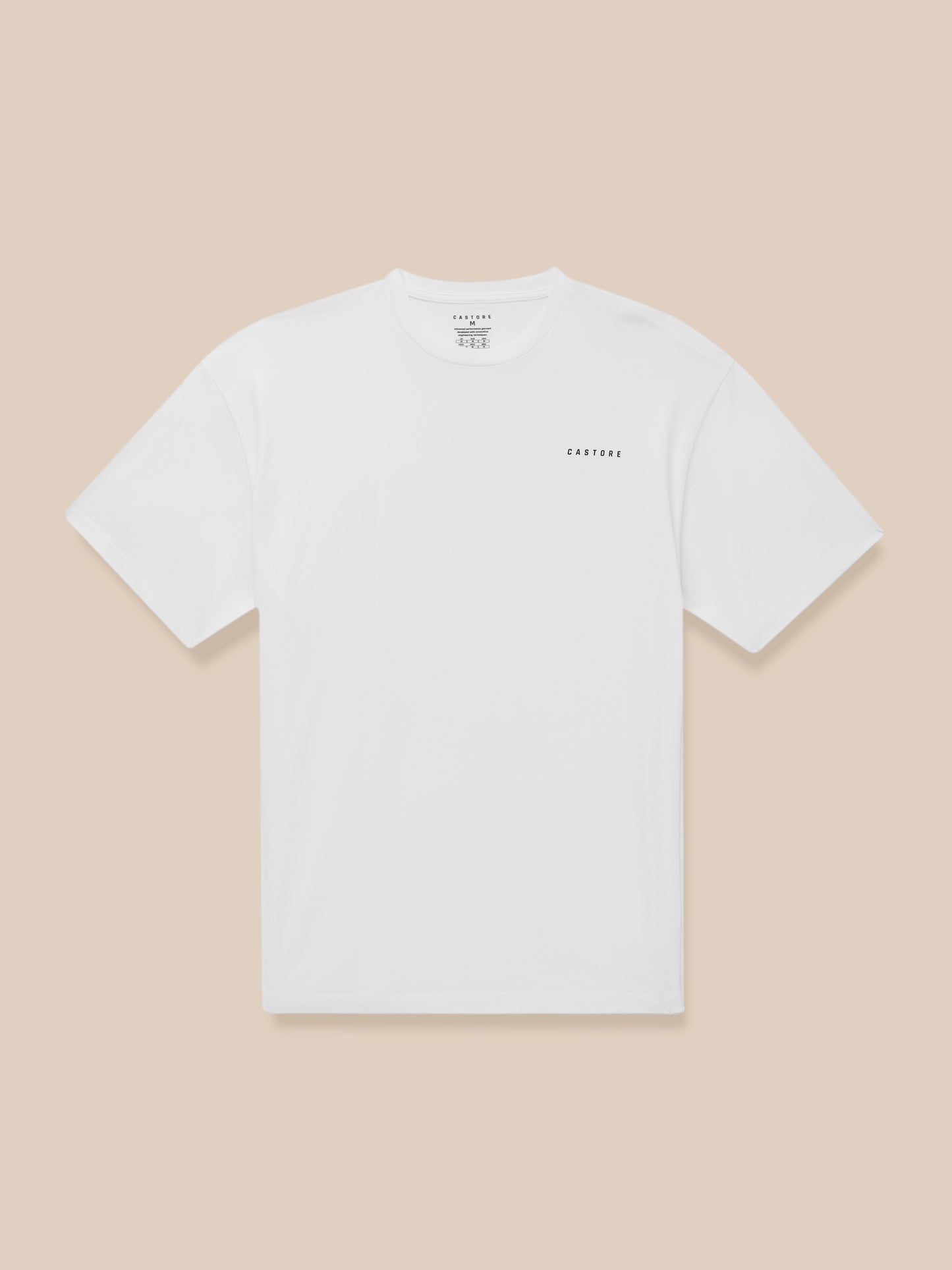 Male model wearing a white short sleeve crew neck T shirt with a small CASTORE logo on the chest