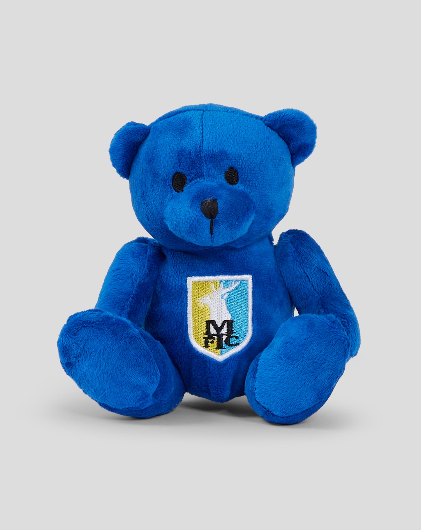 Blue plush Maisie bear with MTFC shield patch on its chest