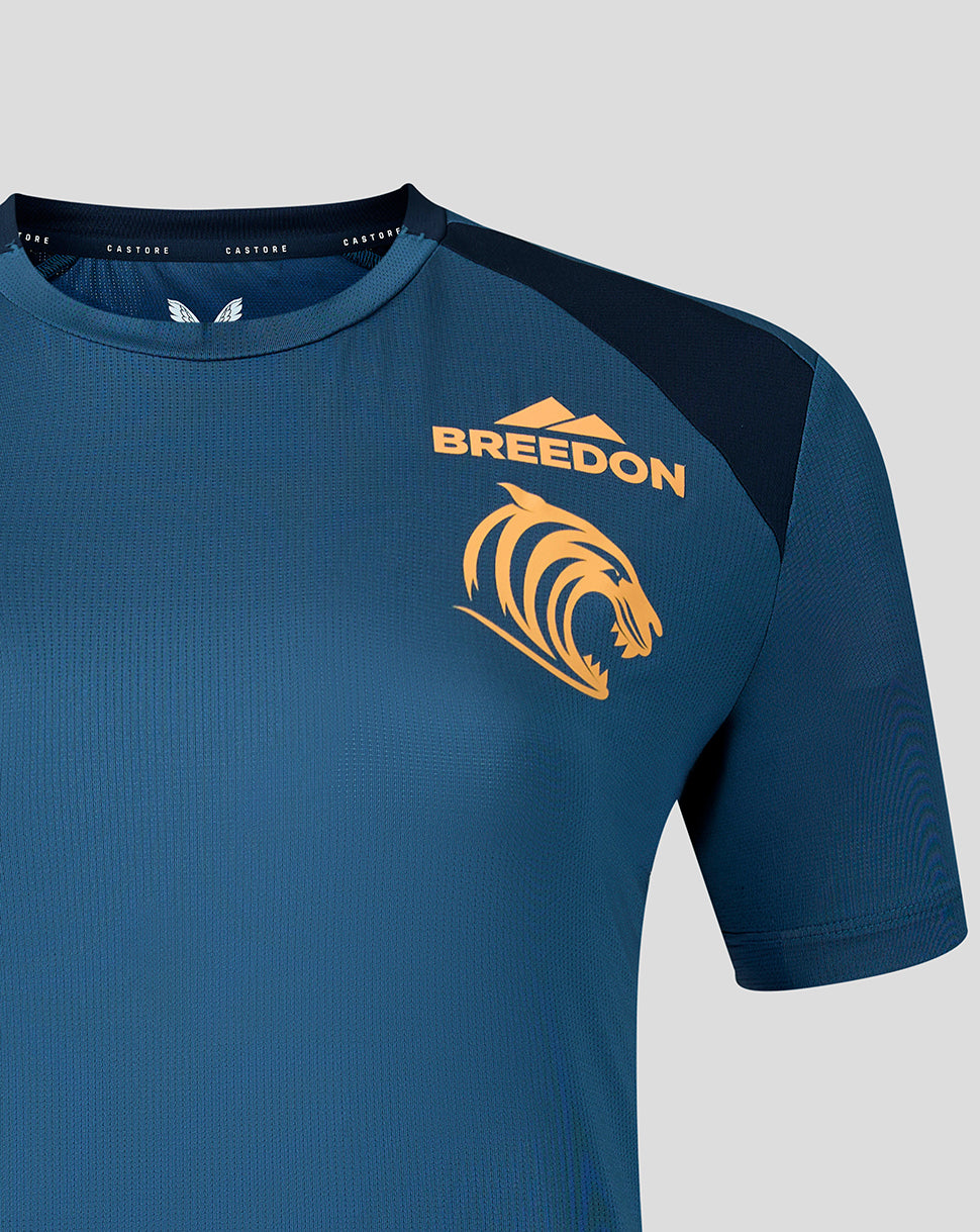 Front view of blue training shirt with Breedon crest on the chest.