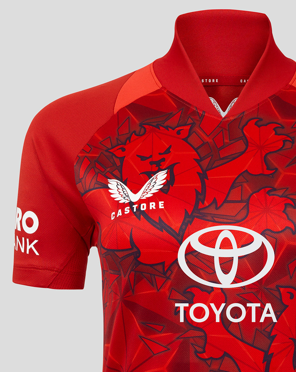 Red England 25/26 T20 replica shirt close up with bold graphic pattern and Toyota logo on the chest.