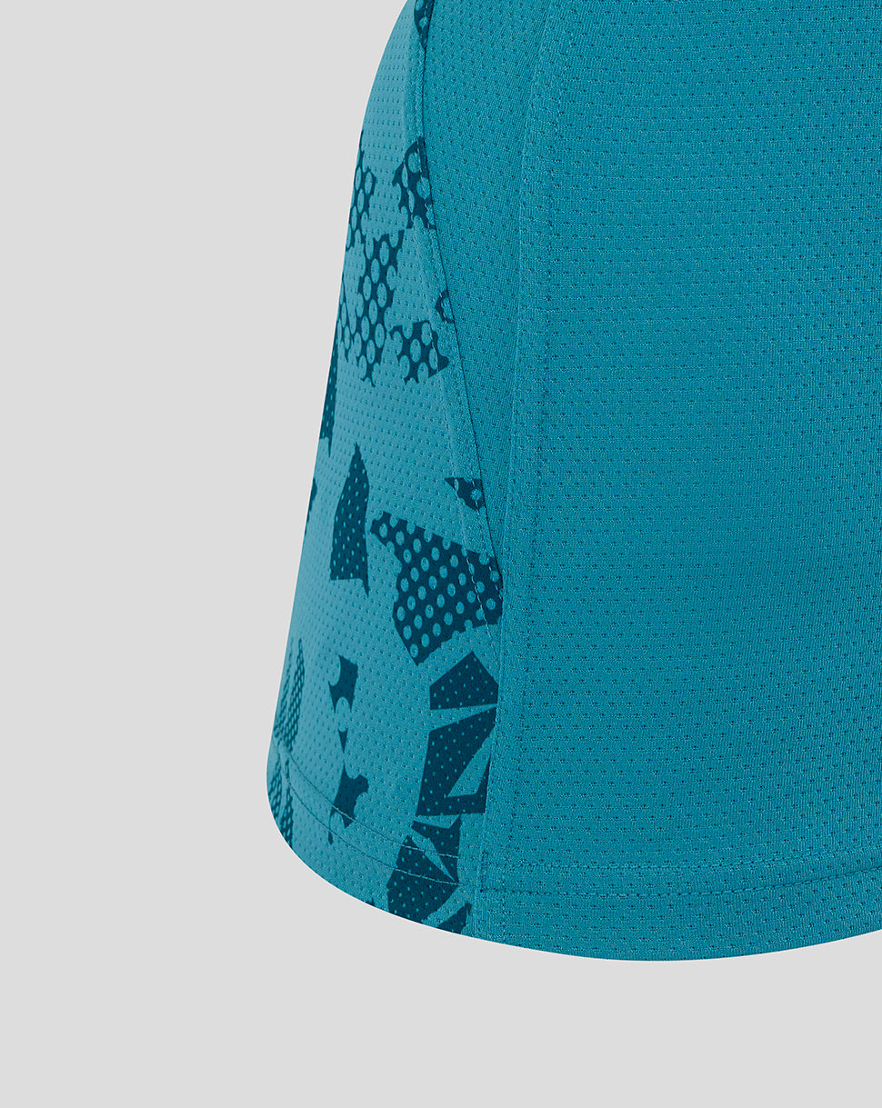 Side view close up of storm blue England Rugby Women’s sleeveless jersey featuring abstract print on side panel and textured fabric