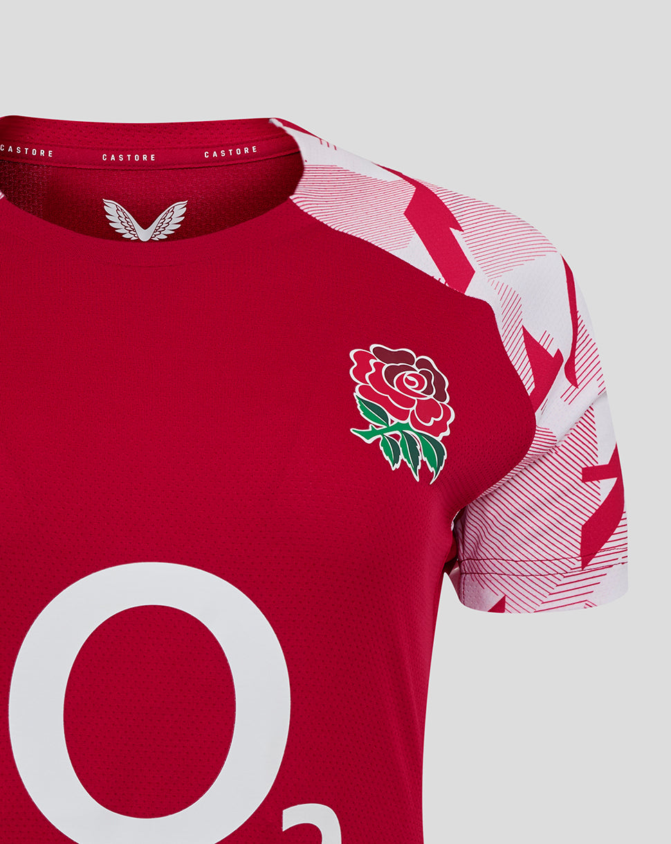 Close up of the England Rugby Red Roses pre match short sleeve shirt with rose crest on the left chest and O2 logo at center.