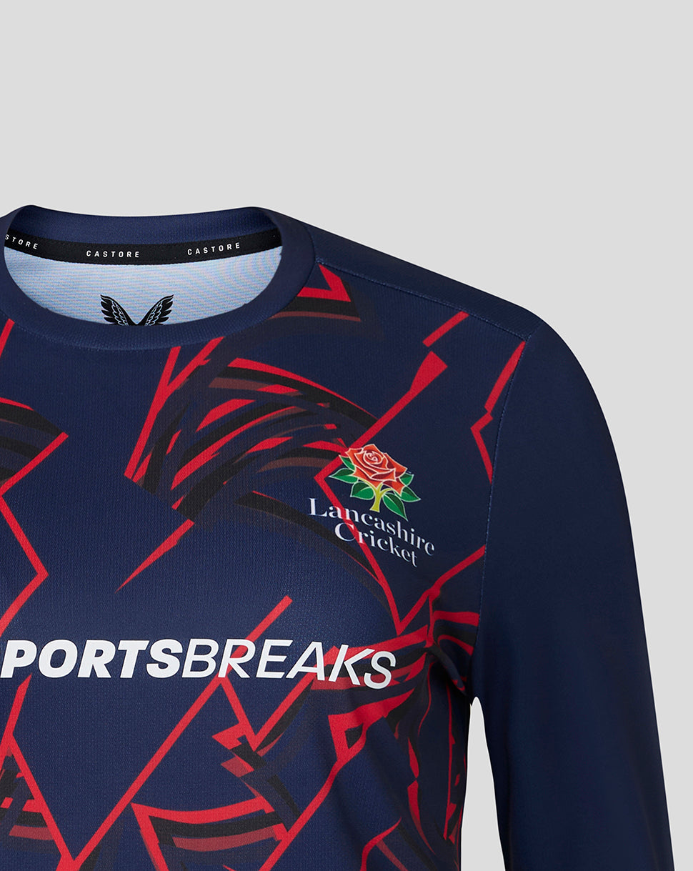 Navy sports jersey with red patterns and Lancashire Cricket logo on a gray background
