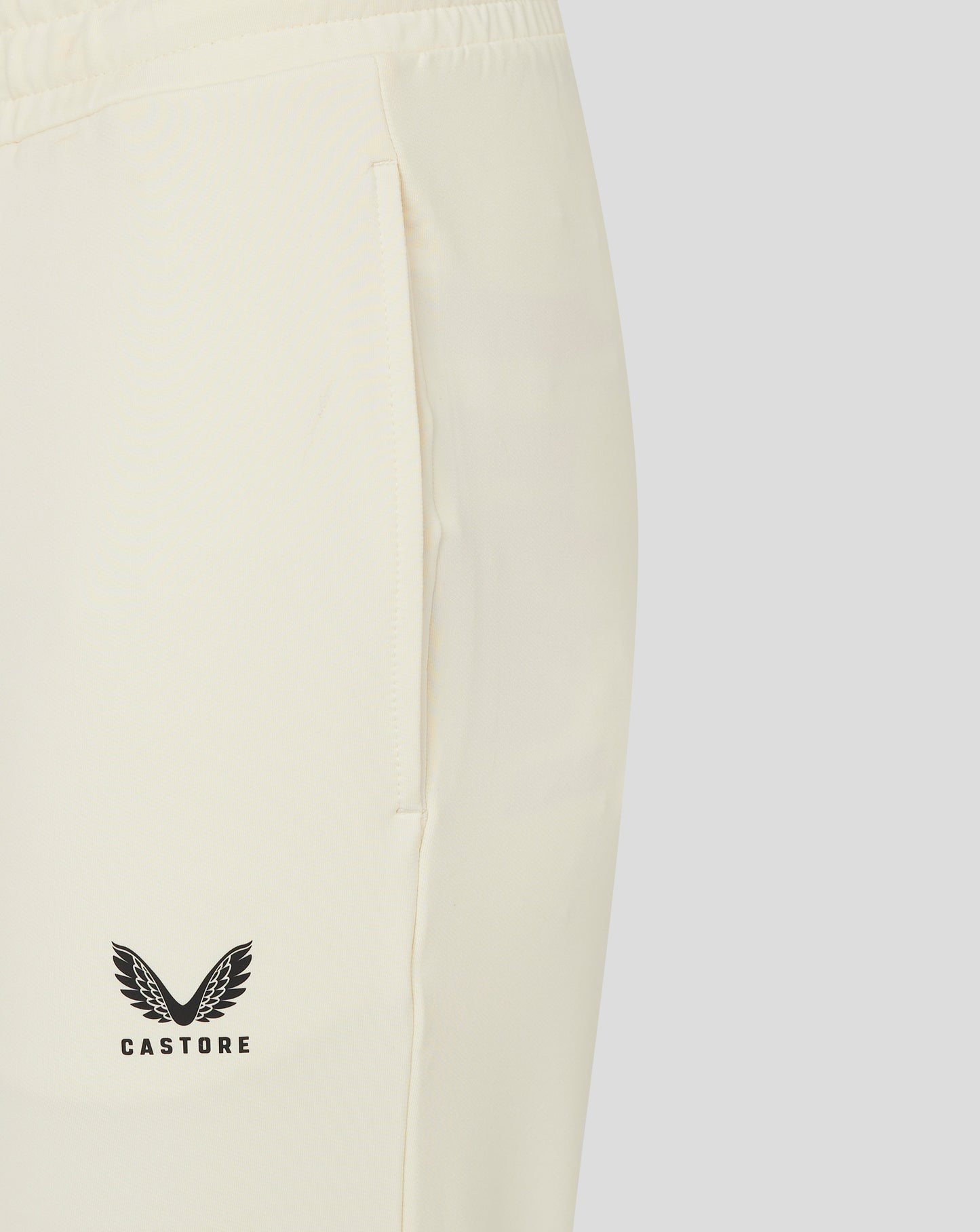 Close up of Cannoli Cream cricket trousers focusing on waistband and edge of pocket