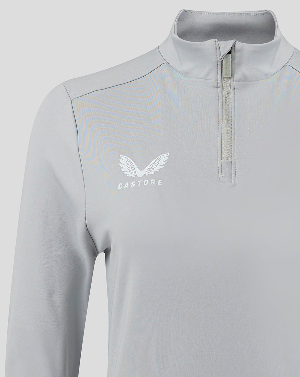 Light gray women's 1/4 zip top with funnel neck and Castore logo on the chest