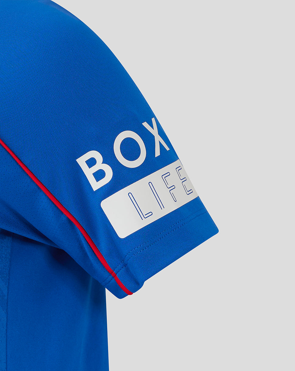 Close up of blue Rangers jersey sleeve with white BOX LIFE patch and red shoulder piping.