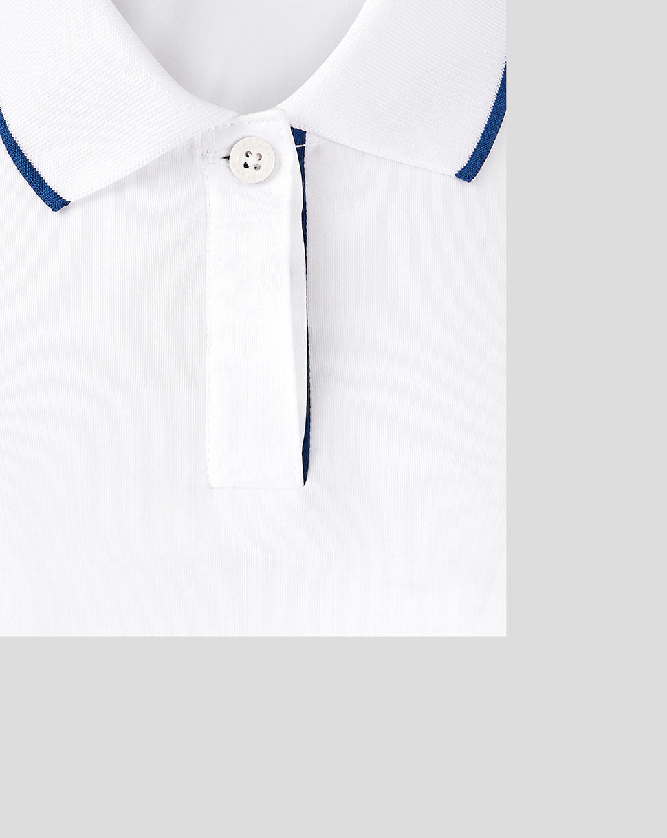 Close up of white polo collar with tipping and concealed placket