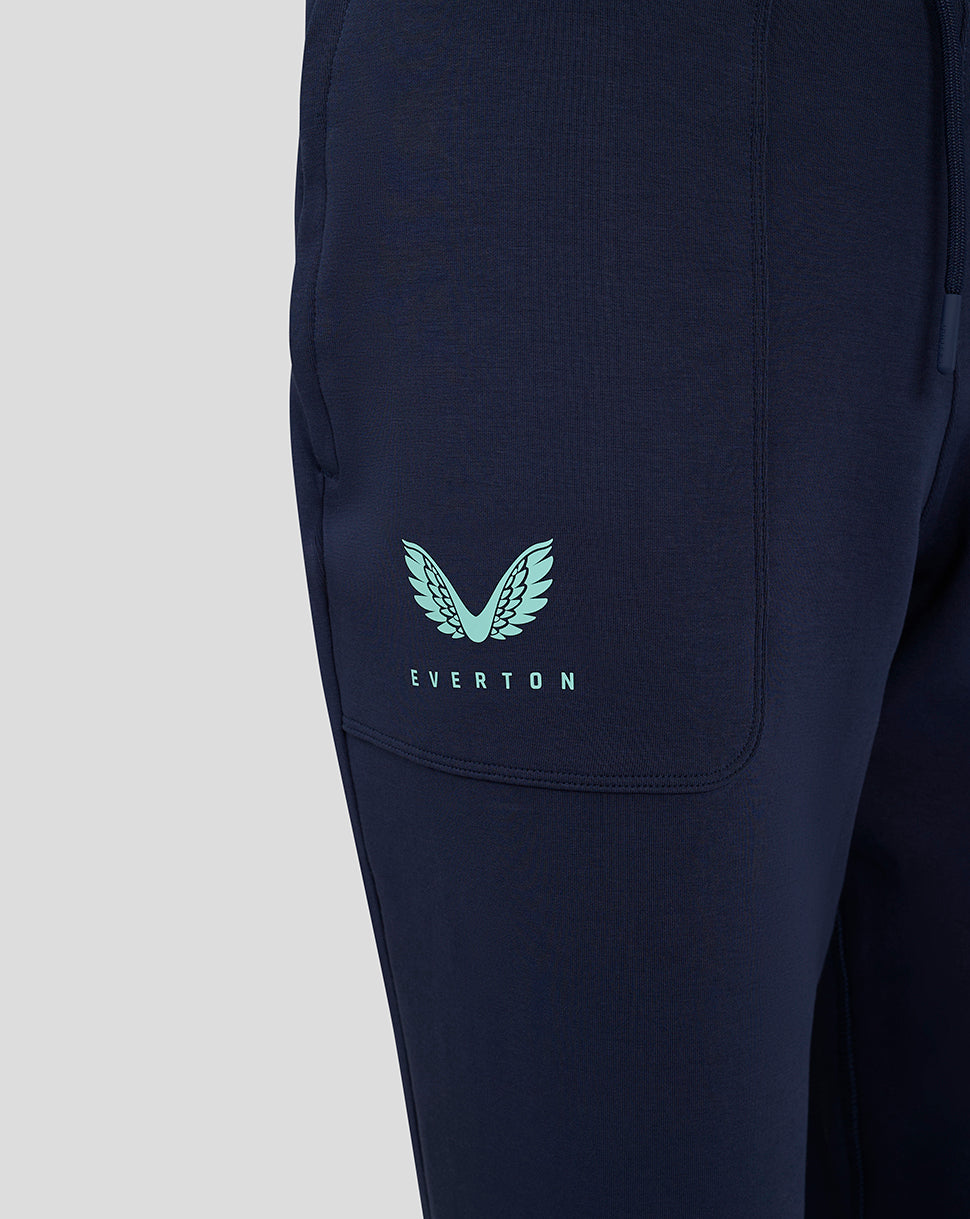 Navy Everton junior travel pant with a mint wing logo on the leg