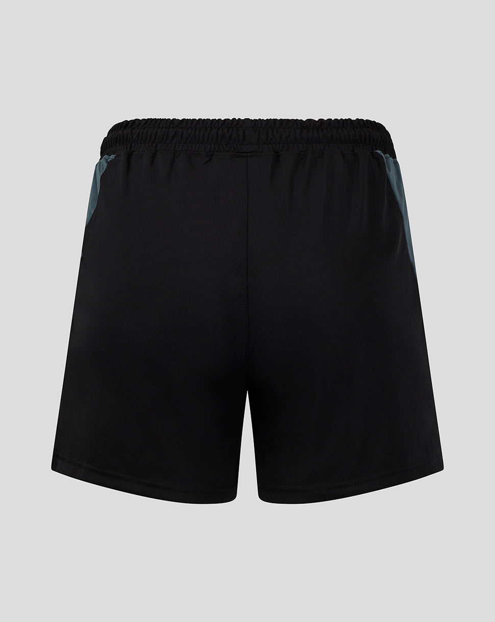 Back view of Preston women's black training shorts with elastic waistband and blue side panels.