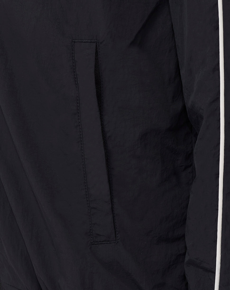 Zip side pocket detail on Rangers travel track jacket in dark fabric