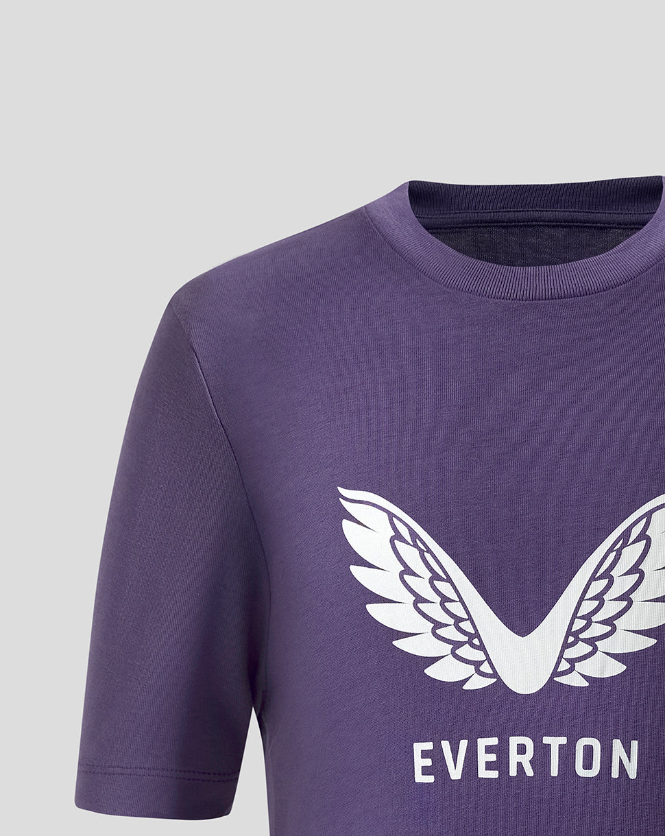 Close up of white wing logo and EVERTON lettering on a purple Loganberry Everton junior T shirt
