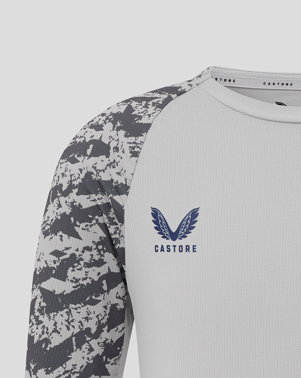 Grey junior training T shirt with camouflage sleeves, round neck, Castore logo and club crest on chest