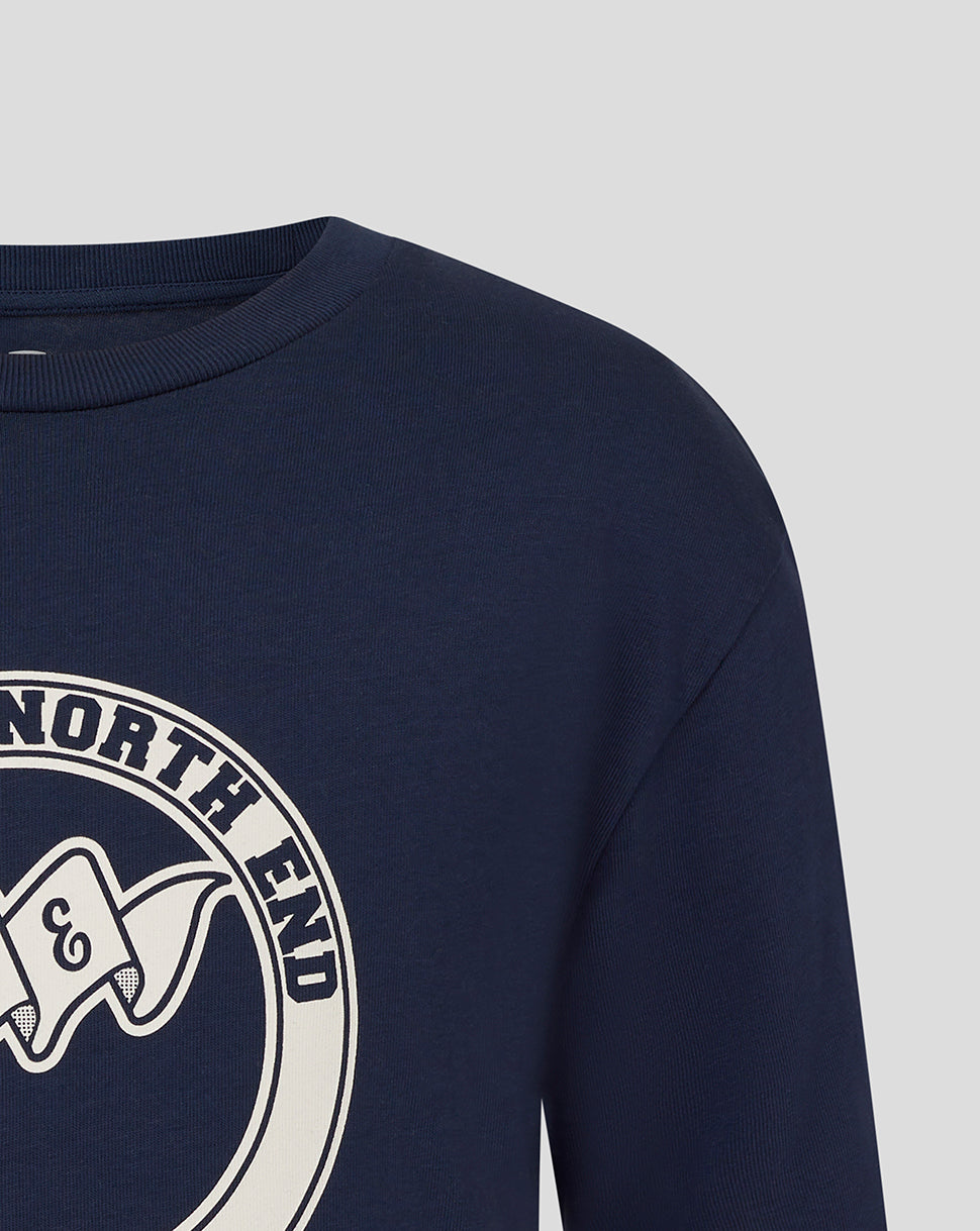 Partial view of navy Preston North End T-shirt with large circular chest logo.