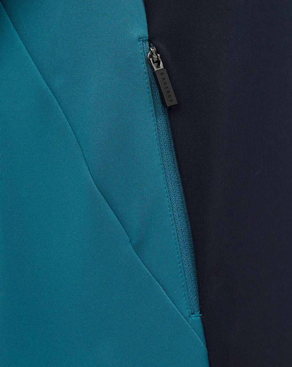 Close up of teal side panel and front zip on junior England rugby hoodie showing Castore zipper pull