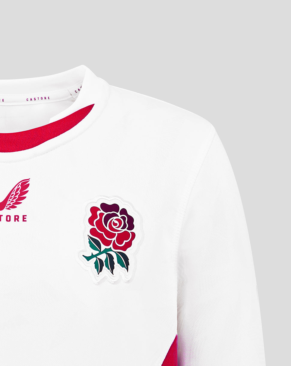 White junior replica rugby shirt with stitched red rose crest on left chest and Castore logo on right.
