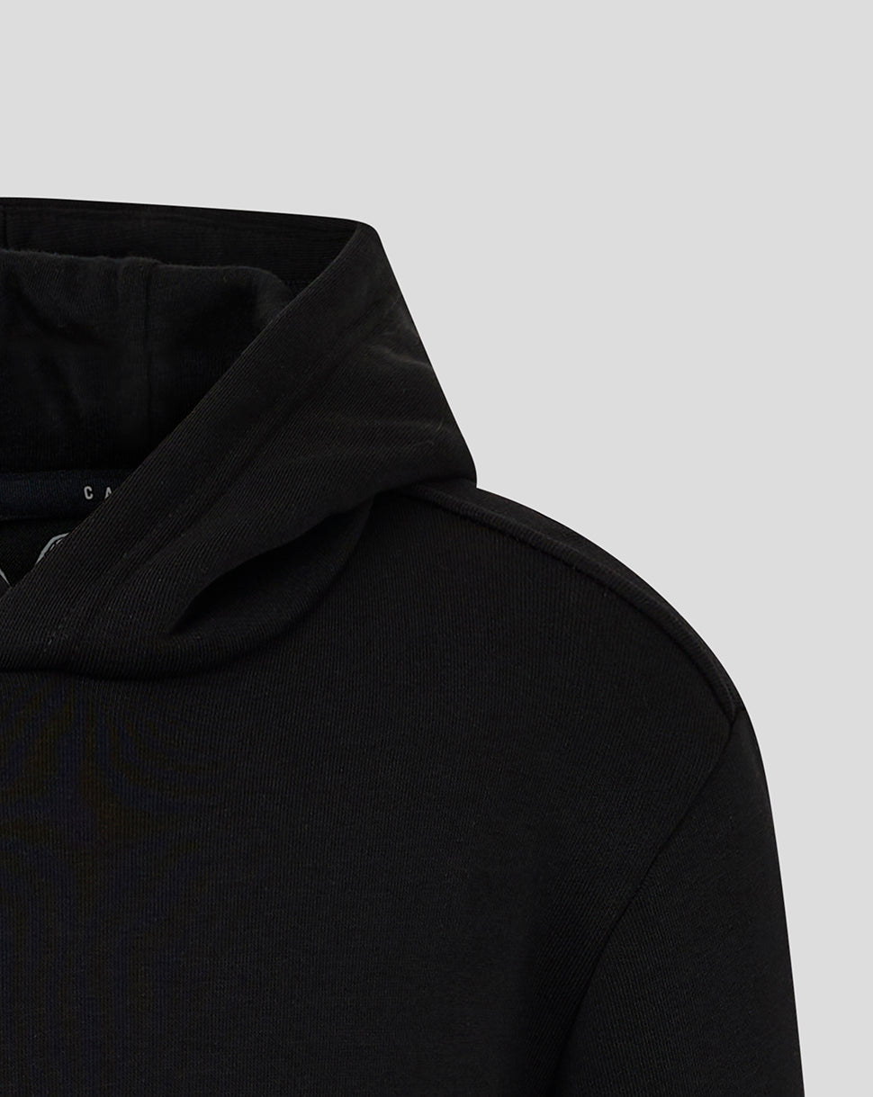 Close up of a black junior cotton hoodie showing the hood and shoulder seam