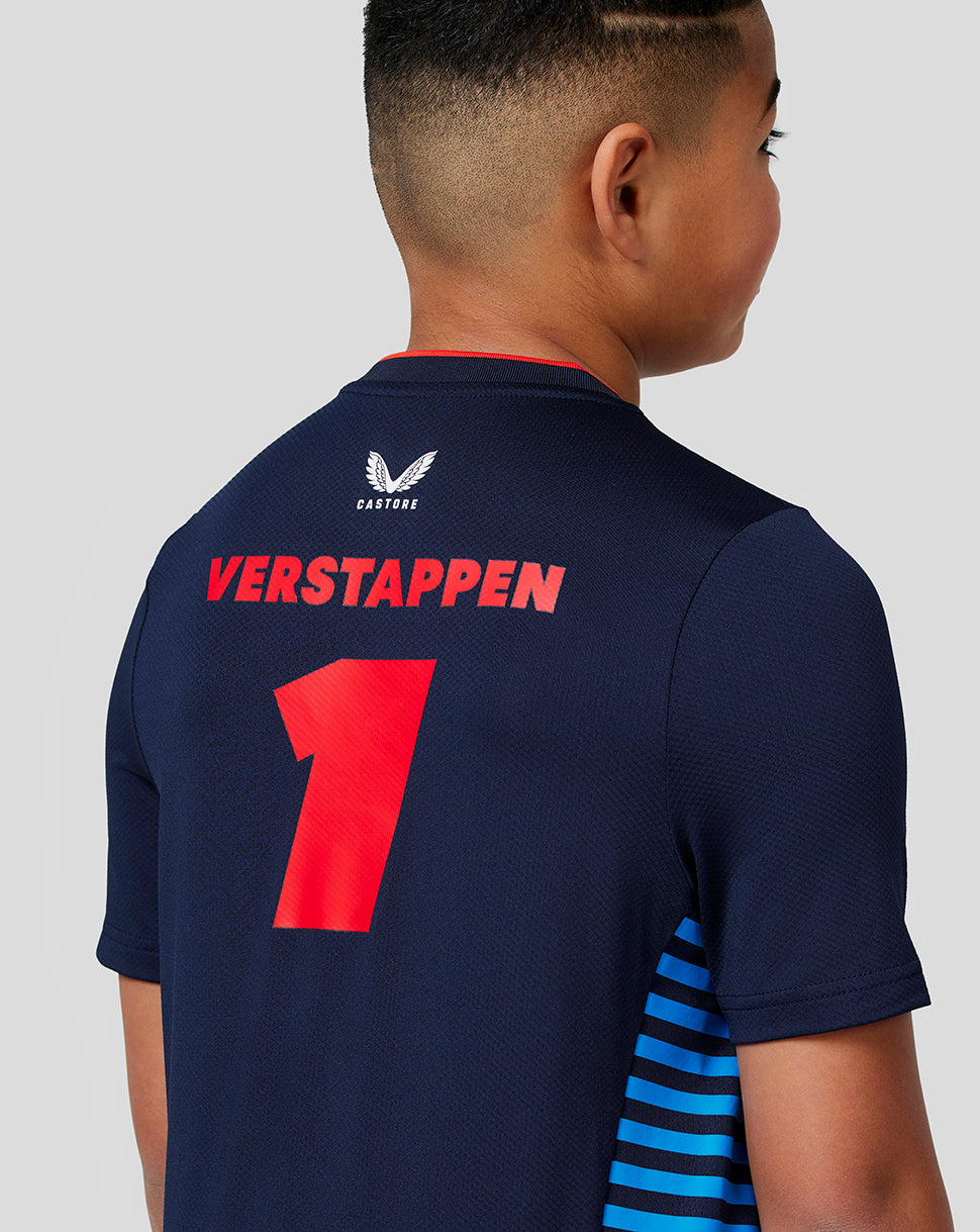 Back view of a young model wearing a navy Verstappen team T shirt with a large red 1 on the back and blue side stripes