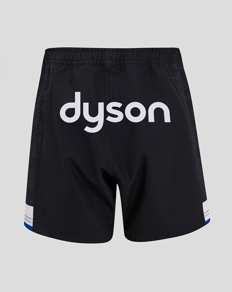 Rear view of Bath Rugby Junior Home Shorts with Dyson branding and a checkered side panel pattern