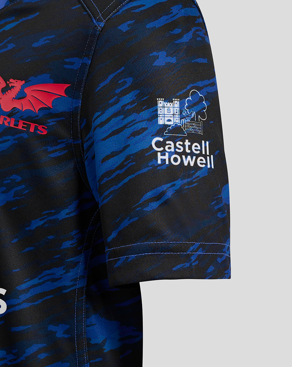 Scarlets away shirt sleeve with Castell Howell logo on blue camouflage fabric