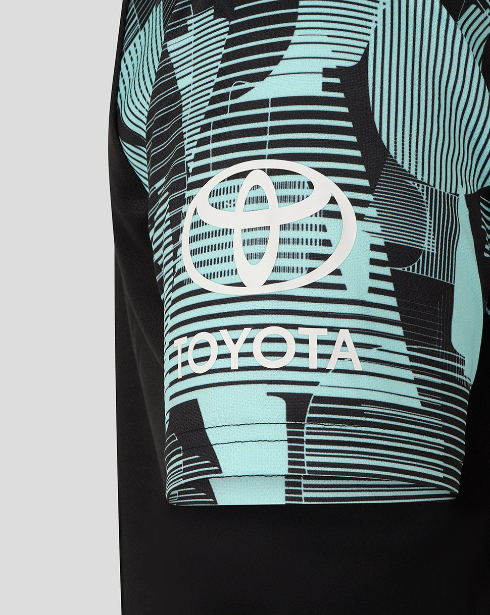 Junior Ashes training tee sleeve featuring Toyota logo on teal geometric print