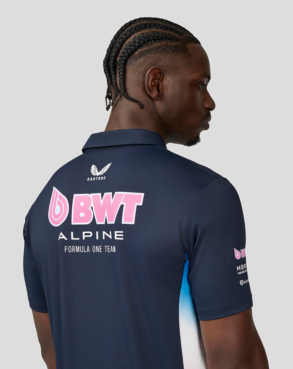 Back view of navy BWT Alpine Formula One Team polo showing large pink BWT logo and Alpine branding