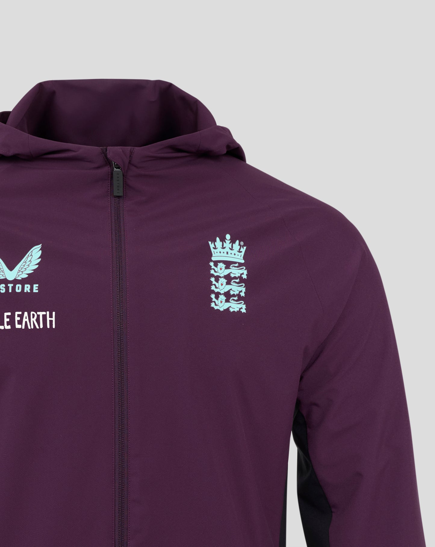 Hooded purple training rain jacket close up with zipper; Castore branding and England crest on chest