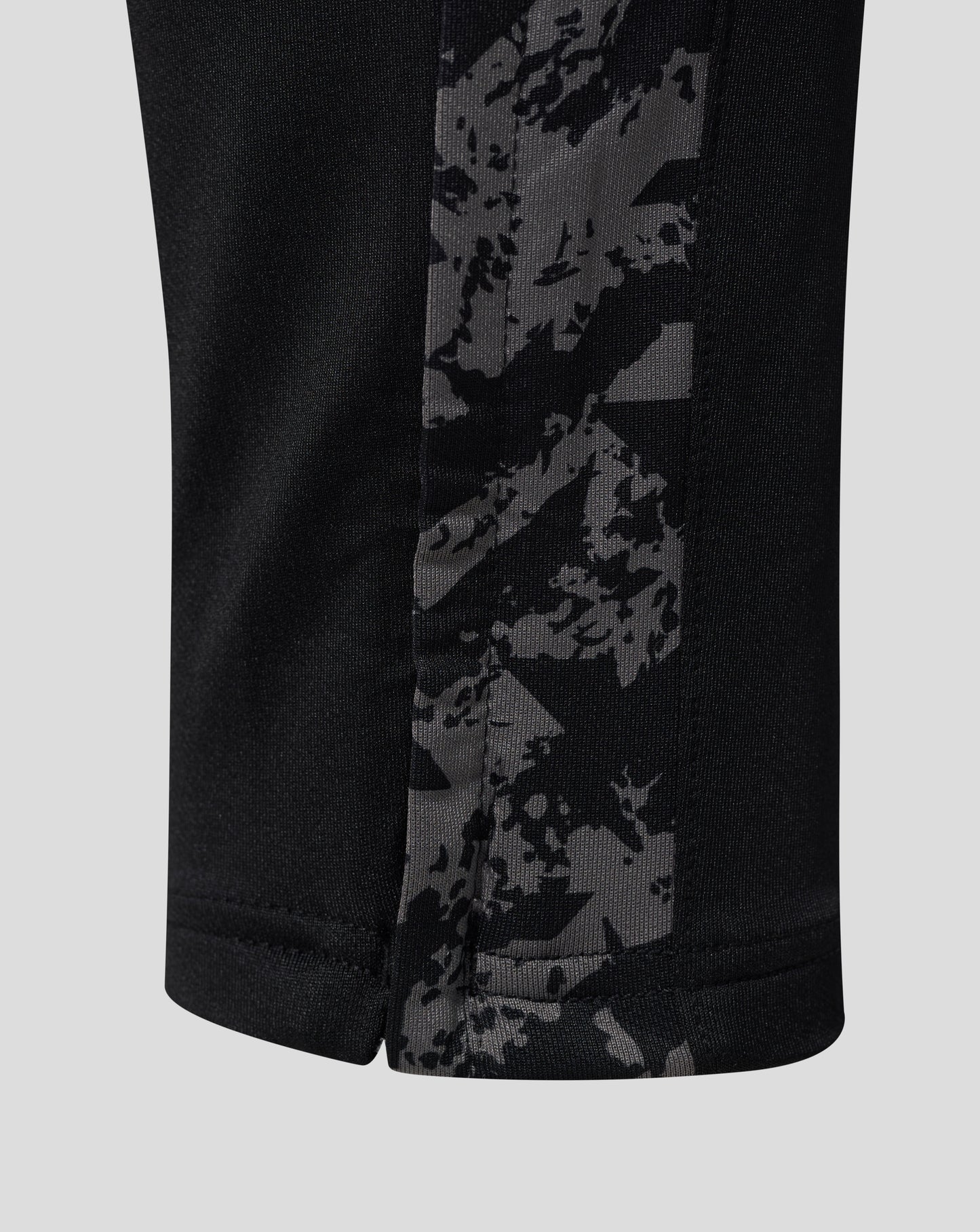 Side stripe with gray camouflage pattern on black Everton performance knit pants