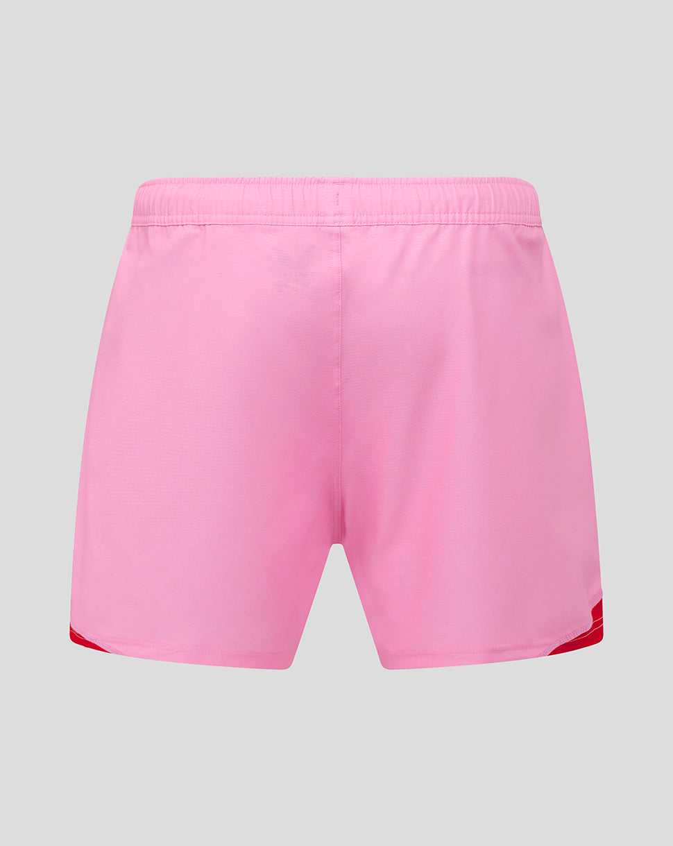 Back view of pink Harlequins away pro shorts with red trim at the leg openings