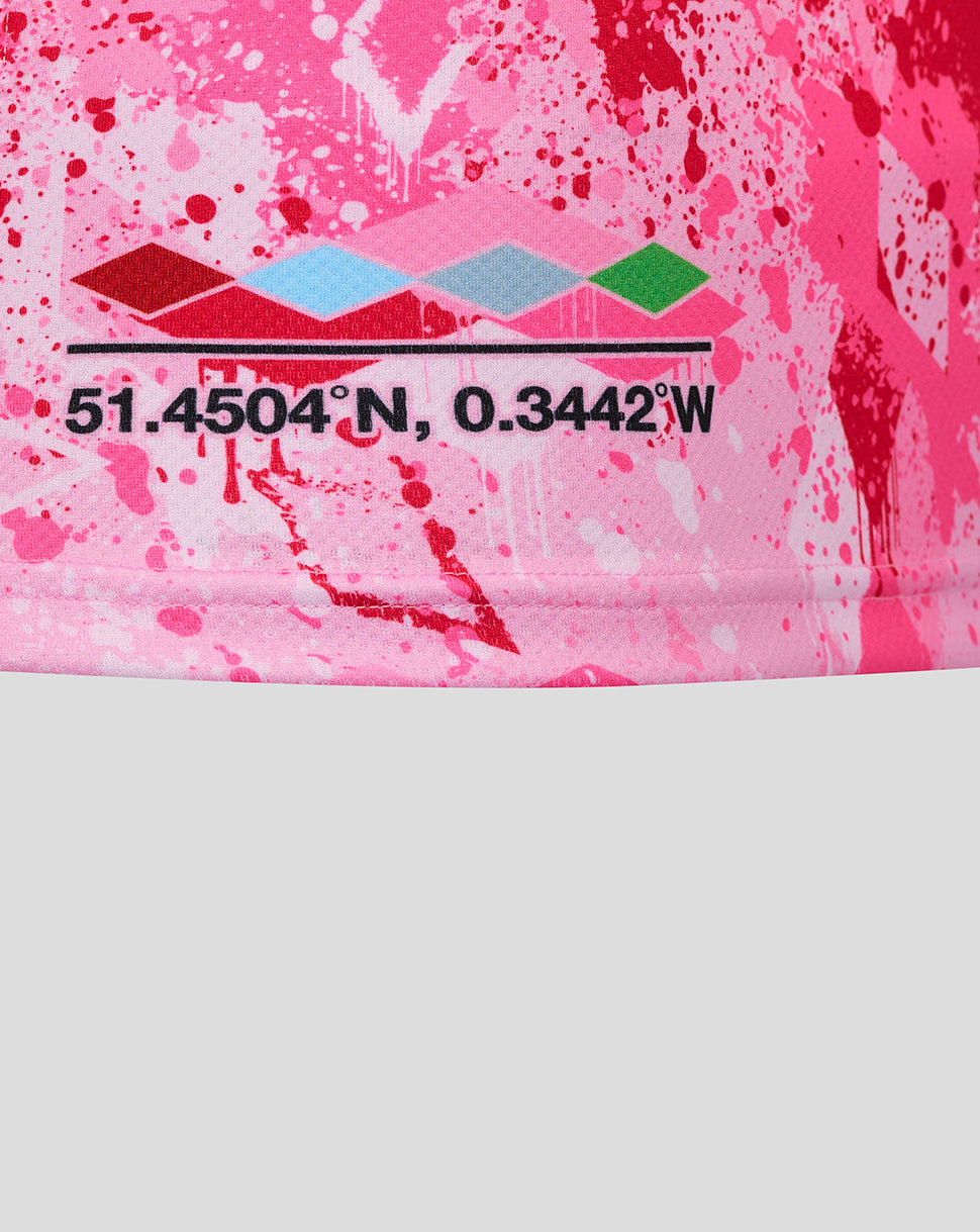 Lower section of the pink Harlequins shirt with coordinates graphic and colorful diamond pattern