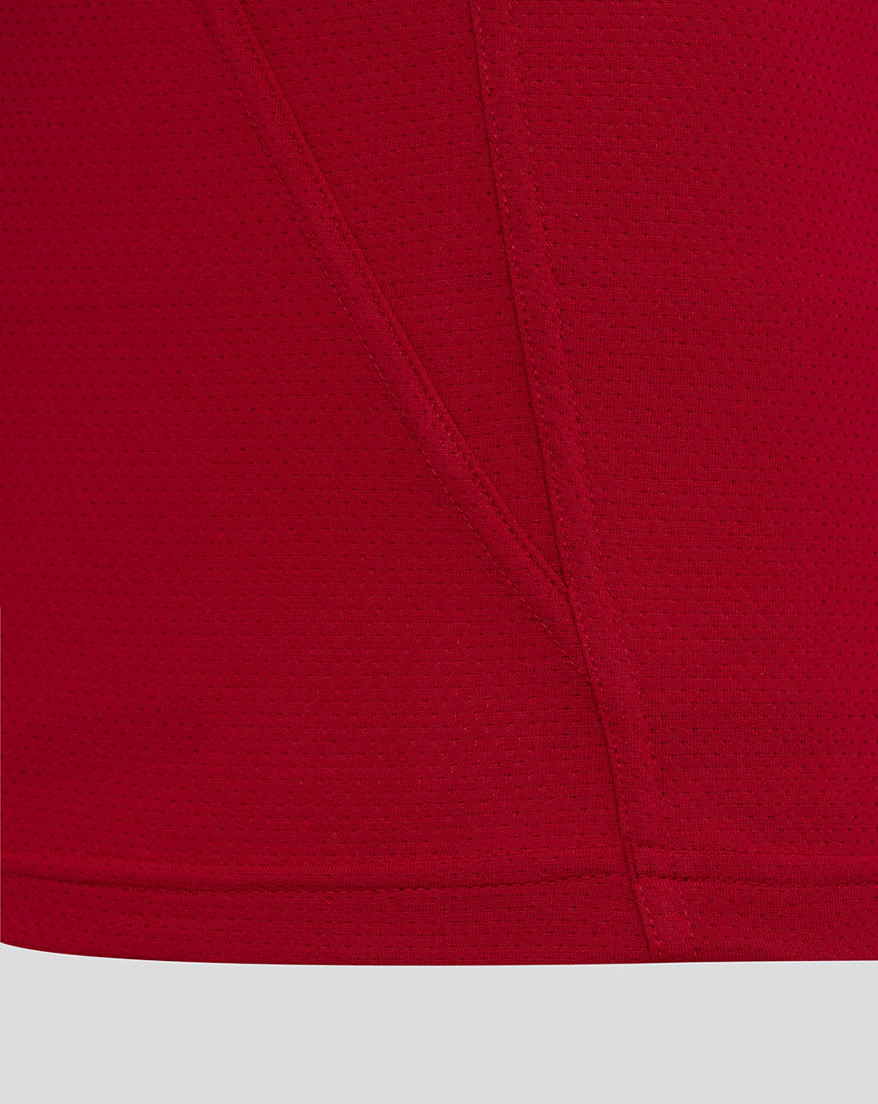 Close-up of red England Rugby pre-match shirt fabric with seam detail