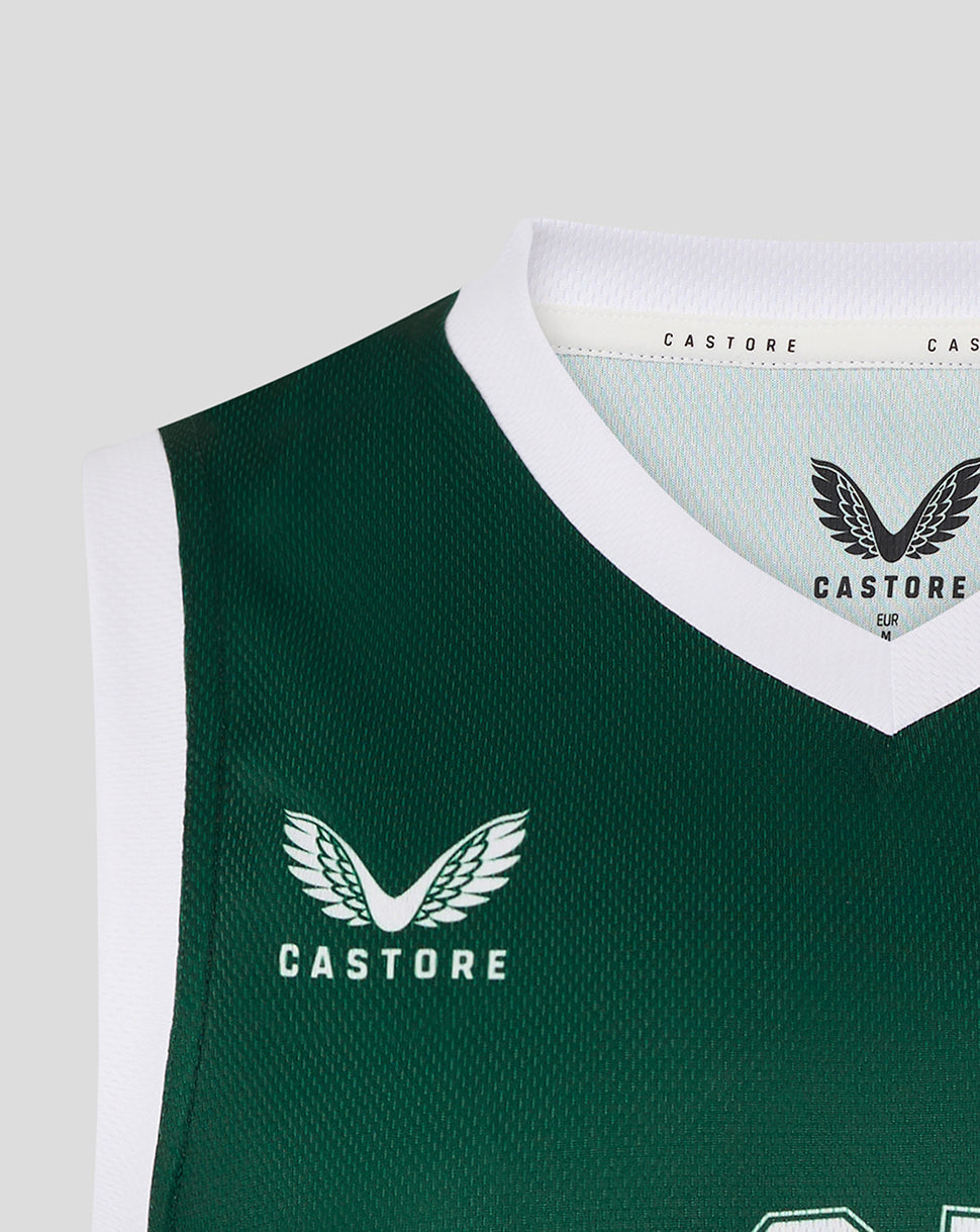 Close-up of the vest chest showing Castore branding and winged logo on green fabric