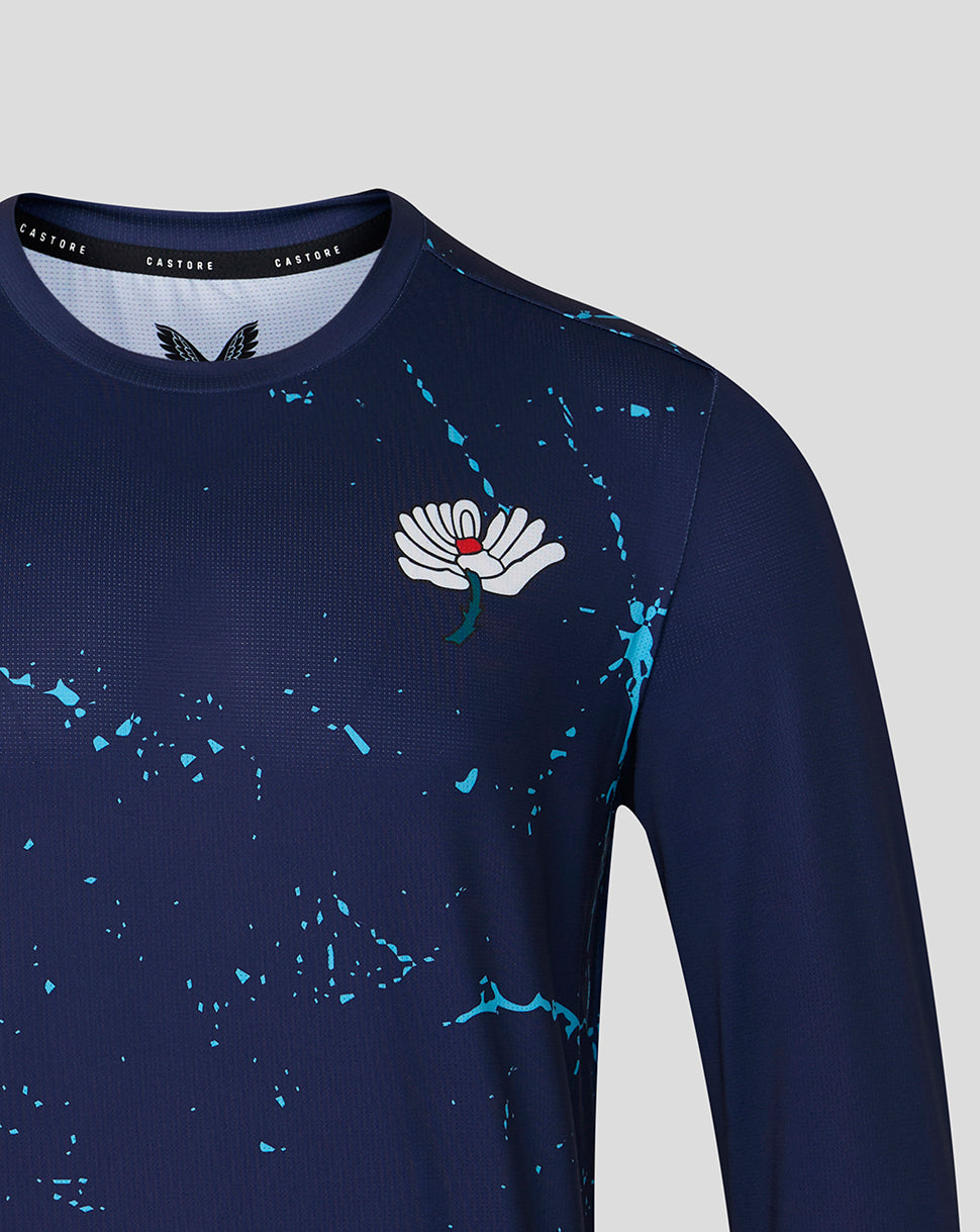Close up of navy Peacoat long sleeve T shirt with Yorkshire rose crest and turquoise splatter design