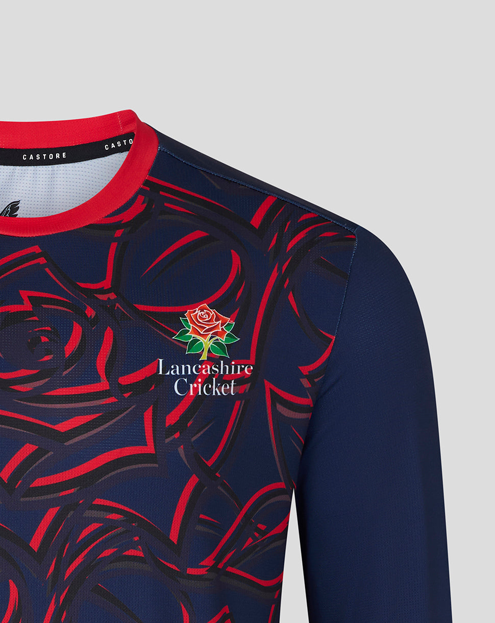 Close up of navy Lancashire Cricket jersey showing the red rose pattern and crest on the chest