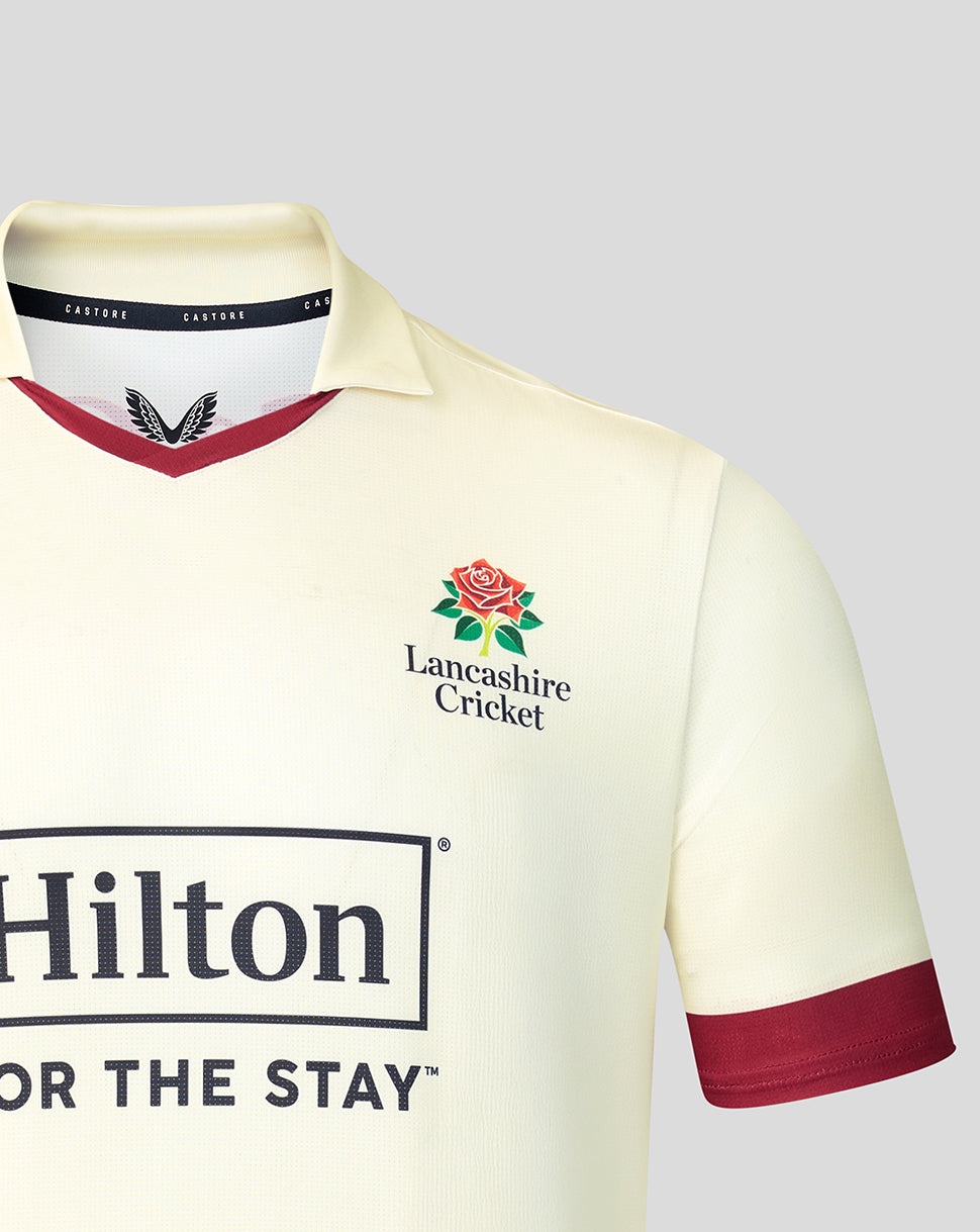 Cream Lancashire Cricket jersey close up showing the Lancashire crest on the chest
