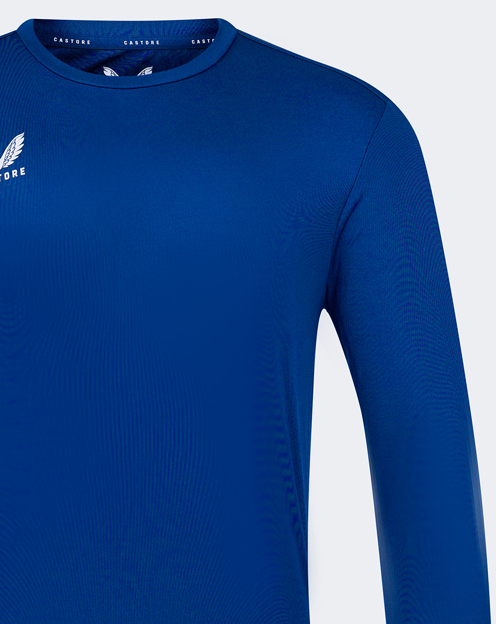 Close up of blue Castore long sleeve tee showing shoulder seam and smooth fabric