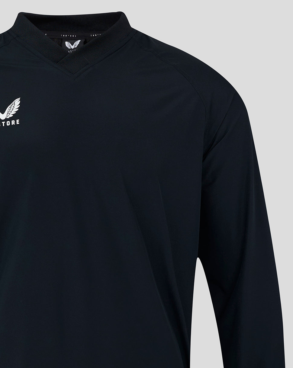 Close up of chest area showing ribbed V-neck collar and Castore logo