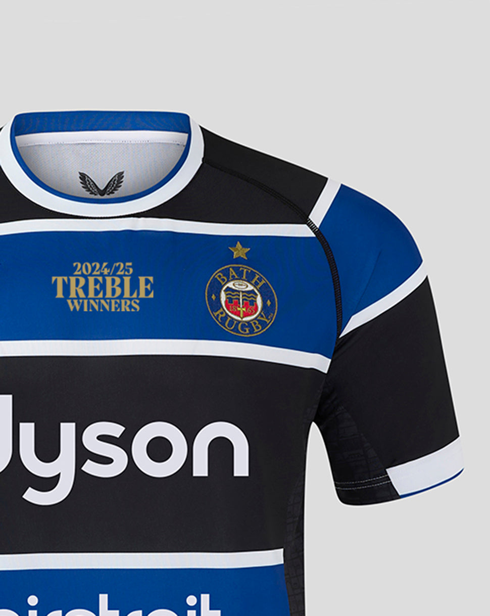 Bath Rugby 24/25 Treble Winners replica home jersey chest featuring crest and Treble Winners emblem